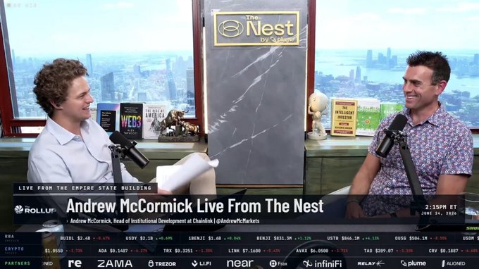 A live financial broadcast titled 'Andrew McCormick Live From The Nest' from The Nest by Tokenize, featuring two men at a desk with stock tickers (BUZ.L, USDY, IBKR, BENZ, USTB, OUSD, FRO, IWM, ZLTA, ALT, TROX, LUFF, NEAR, FIRX, INFI, WELRY, PLUME, ALCHED) at the bottom.