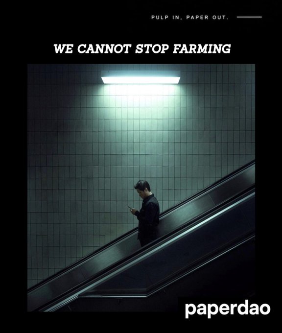A poster with 'PULP IN, PAPER OUT.' at the top, the title 'WE CANNOT STOP FARMING', showing a man looking at his phone while on an escalator under a green-lit ceiling, branded 'paperdao'.