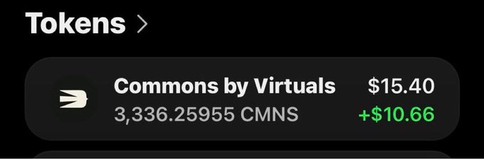 A mobile wallet interface showing a token called 'Commons by Virtuals' (CMNS) with a balance of 3,336.25955 valued at $15.40, up $10.66.