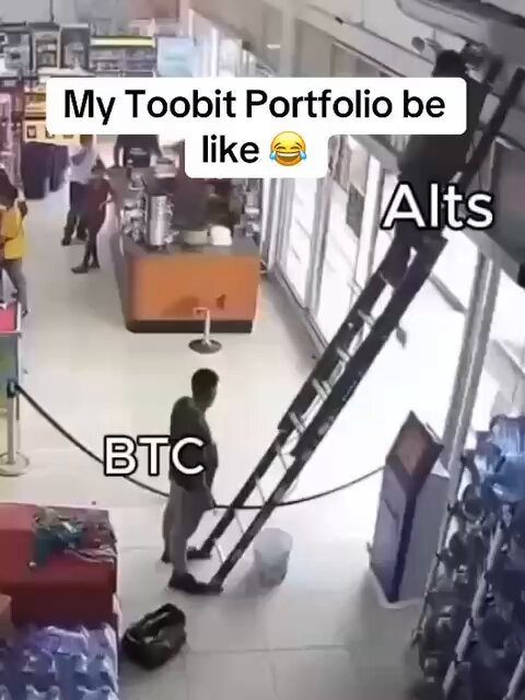 The image shows a man standing next to a ladder, with a sign above him that reads "My Toobit Portfolio be like alt's". The caption below the image states "Tag the friend whose diversified portfolio is just BTC carrying everything #Toobit".