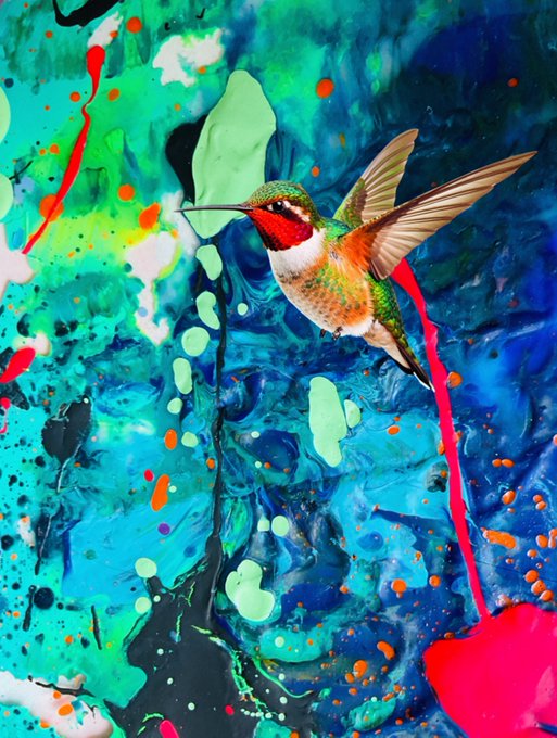 The image features a colorful abstract painting of a hummingbird with its wings spread wide, positioned above a pink heart shape. The background consists of blue and green colors, creating an artistic and vibrant atmosphere. The painting appears to be done on canvas or paper, as indicated by the text "C27 P10 xtz Acrylic painting on canvas!".