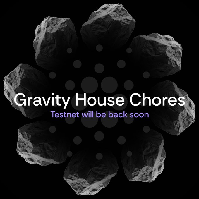 The image features the text "Gravity House Chores" with "Testnet will be back soon" beneath it, set against a black background with gray asteroid-like rocks arranged in a circle. This visually represents the post's announcement about performing maintenance ("chores") on the Gravity platform's testnet, signaling that testing missions will resume soon after the redeployment of their smart contracts on the Cardano blockchain.
