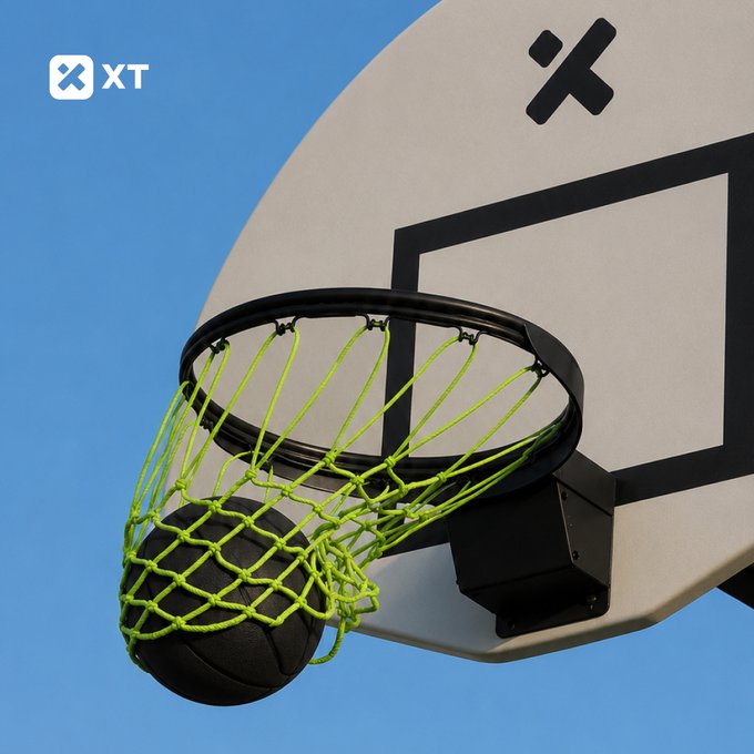 A 3D rendering of a basketball going through a hoop with a green net, featuring a backboard with an 'X' logo and 'XT' branding in the corner against a blue background.