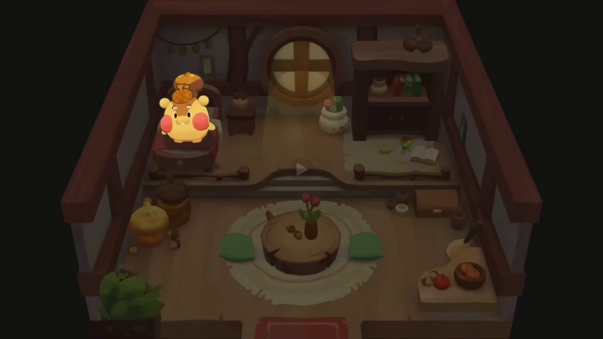 The image features an illustration of a room with various objects, including a small yellow cartoon character sitting on top of a chair. The room appears to be a kitchen or dining area, as there are several bowls placed around the space. A clock is also visible in the scene. The post discusses the release date and time for a new video game, which seems to be related to Axie Infinity. It suggests that the gaming company is planning to release the game on August 5th, starting from the end of June.