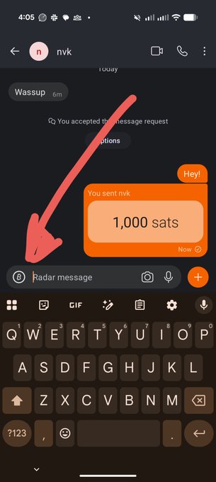 A smartphone screenshot of a chat with user 'nvk' showing a sent payment of 1,000 sats, with a red arrow pointing to the message.