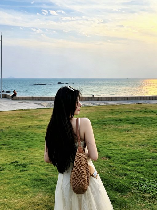 A woman with long dark hair stands by a seaside at sunset, carrying a woven rattan bag while gazing out at the ocean.

The image doesn't visually reference crypto markets, but its calm, contemplative seaside scene contrasts with the post's message—suggesting a moment of leisure and reflection away from worrying about Big Pie's sudden price spike or the $700M+ BTC ETF outflows triggered by the failed bill and rate hike news.