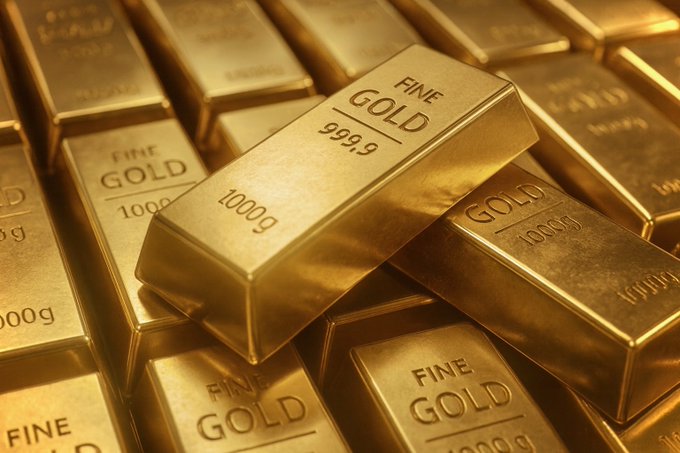 The image shows a close-up view of a pile of gold bars, with some of them being fine gold bars and others possibly being fake gold bars. The text in the image reads "Fine Gold" for the fine gold bars and "Fake Gold" for the fake gold bars. The post also mentions Bitcoin wiping out $1.1 Trillion in a single day, which is related to the fine gold bars as it could be an indication of the value of Bitcoin compared to gold.