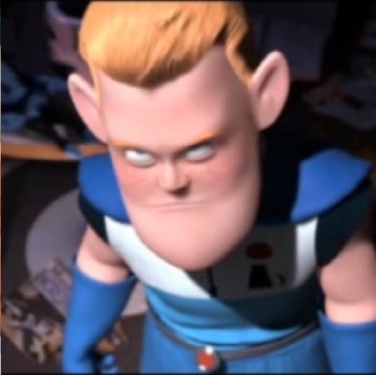 A close-up 3D animated shot shows a blond man with white eyes and an angry expression, wearing a blue, white, and black suit.