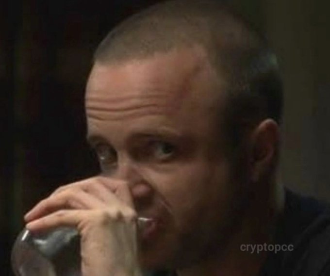 Meme image of a bald man holding a glass with a shocked, wide-eyed expression, with a "cryptopce" watermark in the bottom right corner.