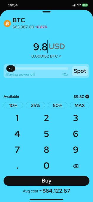 A blue-themed mobile cryptocurrency trading app showing BTC at $63,987.00 (+0.82%), with a buy order form for 9.8 USD (0.000152 BTC) using 40x spot leverage, and an average cost noted as ~$64,122.67.