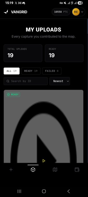 The image shows the VANGRID app displaying a "MY UPLOADS" page with 19 total uploads, all marked as "READY." This relates to the post about contributing real-world footage to @vangrid_io, as the screenshot demonstrates the progress made in uploading everyday environment captures, showing 19 ready submissions for Physical AI data collection.