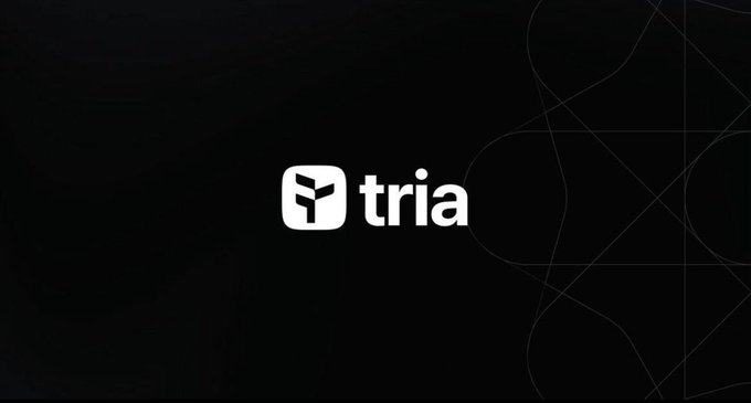 The image features a black background with white text that reads "Tria" at the top of the frame. Below this, there are two circles, one larger than the other, which appear to be part of an advertisement or promotional design for Web3. The text on the circles is in a smaller font size compared to the rest of the image. This design choice creates a sense of depth and visual interest by using contrasting colors and sizes.