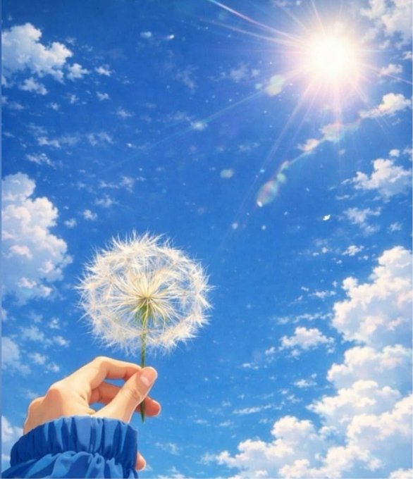 A hand holds a delicate dandelion against a bright blue sky with scattered clouds and shining sun, symbolizing the fragile yet powerful spread of privacy-first ideals that Beldex Coin champions. The image evokes freedom, growth, and the dissemination of protected digital identity across an open world.