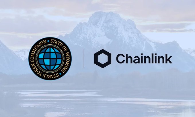 A graphic showing the seal of the 'Wyoming Stable Token Commission, State of Wyoming' alongside the 'Chainlink' logo against a mountain landscape background.