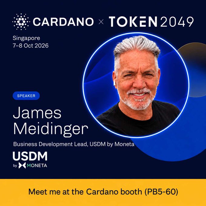 A promotional graphic for CARDANO × TOKEN2049 in Singapore on 7-8 Oct 2026, featuring speaker James Meidinger, Business Development Lead for USDM by Moneta, with text inviting viewers to meet him at the Cardano booth (PB5-60).