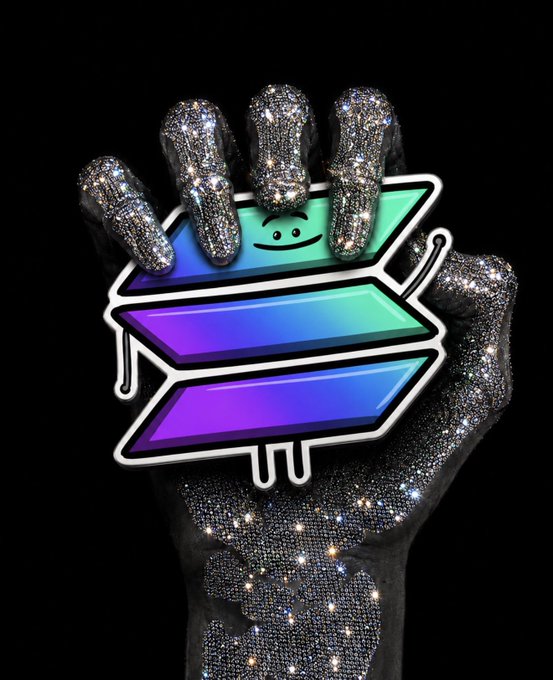 A glitter-covered hand clutches the iconic "Stonks" meme logo—a stylized, colorful upward arrow with a smiling face—against a black background, symbolizing the bullish crypto market enthusiasm tied to the post's celebration of Solana-based memes, collectibles, and RWAs.