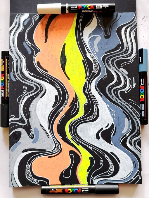 An abstract artwork with metallic silver, orange, yellow, and blue flowing patterns is displayed with several Uni Posca markers arranged around the edges of the canvas.
