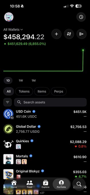 A screenshot of a crypto wallet app showing a portfolio balance of $458,294.22, with a list of assets including USD Coin, Global Dollar, Quirkies, Mortals, and Original Blokyz.
