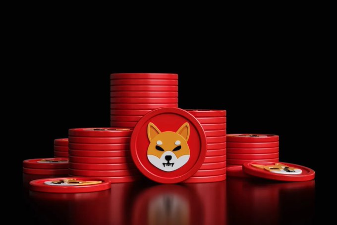Stacks of red Shiba Inu (SHIB) cryptocurrency coins are arranged on a black surface, with the iconic dog face logo prominently displayed.