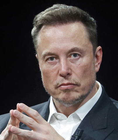 The image shows Elon Musk, the CEO of SpaceX, with his hands clasped together. This relates to the post as it discusses a venture capital firm's massive $40 billion stake in his company, SpaceX.