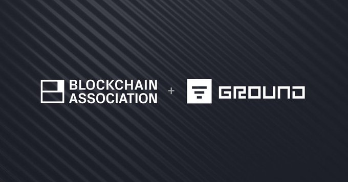 A logo graphic displaying "BLOCKCHAIN ASSOCIATION + GROUND" in white text on a dark striped background.