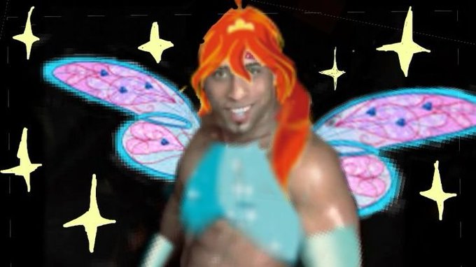 The image features a man with red hair wearing an orange wig and a blue outfit that resembles a fairy or magical creature. The background of the image is black, but there are stars scattered throughout the scene, adding a whimsical touch. The caption above the image reads "the speed at which @PythNetwork is growing right now is completely wild. by putting crypto, fx, equities, and real-world commodities like cocoa, sugar, and crude oil under a single api", suggesting that the man's costume could be related to cryptocurrency or financial technology in some way.