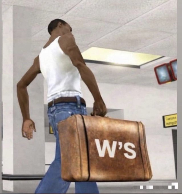 A muscular man in a white tank top and jeans carries a large brown briefcase labeled 'W's' through what appears to be an office hallway, in a scene reminiscent of the 'Big Baller Brand' meme.