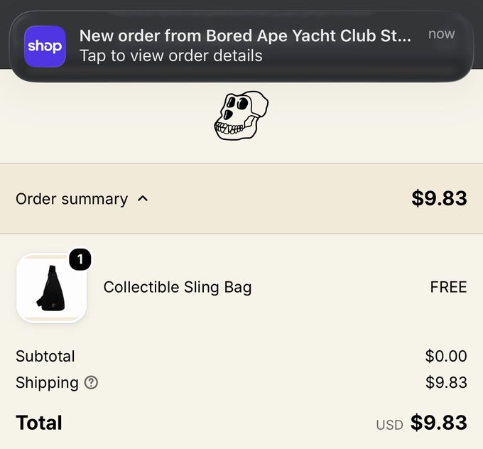 A smartphone screenshot of a Shop app order notification for Bored Ape Yacht Club, showing a 'Collectible Sling Bag' for FREE, with a subtotal of $0.00, shipping of $9.83, and a total of $9.83 USD.