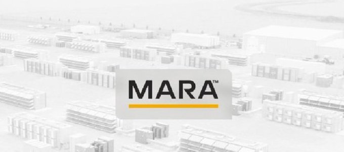 A faded background showing an industrial facility with stacks of materials overlaid with the MARA logo (a cryptocurrency/Bitcoin mining company).