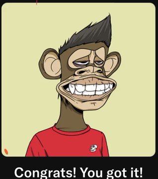 The image features a cartoon monkey wearing a red shirt with a white skull and crossbones symbol on it. The monkey has a big smile, indicating that he's happy or content. The background of the image is yellow, which contrasts nicely with the monkey's red shirt. In the bottom right corner of the image, there are two text boxes: one congratulating the user for getting their first Ape back and another stating "You got it!".