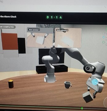 A screen capture of a robotic arm simulation or game called 'the Alarm Clock' showing a dual-arm robot interacting with objects on a table.