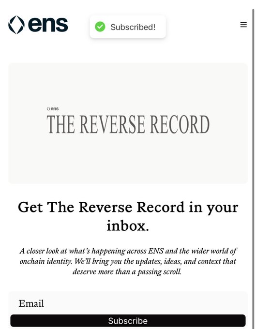A webpage for ENS (Ethereum Name Service) newsletter titled "THE REVERSE RECORD," with a green "Subscribed!" confirmation badge and a description about getting onchain identity updates.