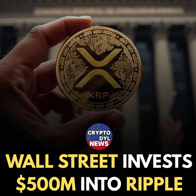 A hand holds a gold XRP (Ripple) coin against a dark background, with text below reading "WALL STREET INVESTS $500M INTO RIPPLE" alongside a "CRYPTO DYL NEWS" logo, visually reinforcing the headline about significant institutional investment in Ripple's cryptocurrency.