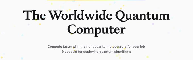 The image features a banner with white text that reads "The Worldwide Quantum Computer" against a gray background, accompanied by a small yellow circle containing a black dot. The image also includes a link to a website called "quipnetwork", which is described as a platform for connecting people interested in quantum computing and making it accessible through a decentralized network.
