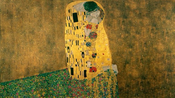 This image depicts Gustav Klimt's iconic 1907-1908 painting "The Kiss," showing two embracing figures wrapped in a shimmering golden robe adorned with geometric patterns, set against a gold background with a colorful flower-filled meadow below.