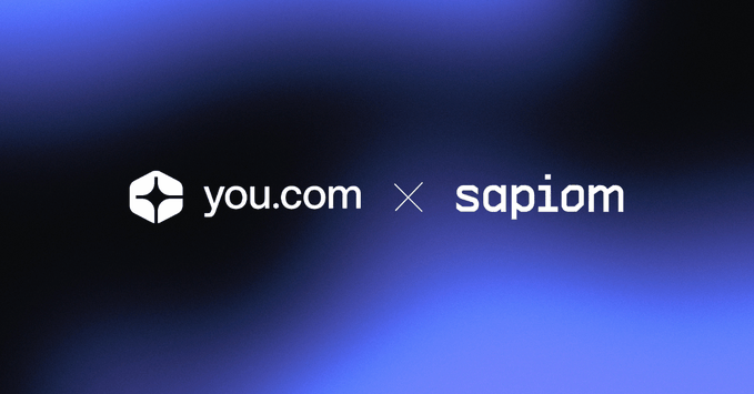 A logo collaboration graphic on a blue gradient background showing 'you.com' with its geometric icon next to 'sapiom'.