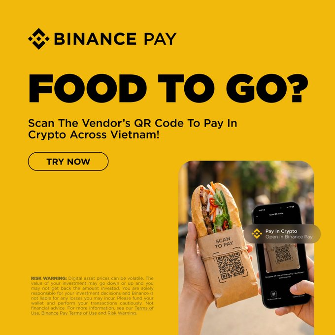 A Binance Pay advertisement with a bright yellow background promoting "FOOD TO GO?" in Vietnam, featuring an image of a bánh mì sandwich in branded packaging with a "SCAN TO PAY" QR code alongside a smartphone displaying the Binance Pay app interface for crypto payments.