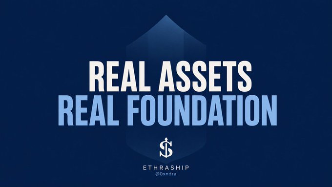 Dark blue graphic with text 'REAL ASSETS, REAL FOUNDATION' in cream and blue lettering, featuring a dollar sign icon and the branding 'ETHRASHIP' with handle '@oxndra' below.