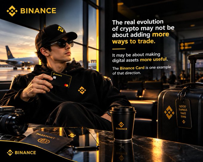An advertisement for Binance features a man in a black hoodie and sunglasses holding a Binance Card, with text reading 'The real evolution of crypto may not be about adding more ways to trade.' and 'BINANCE' logo visible.