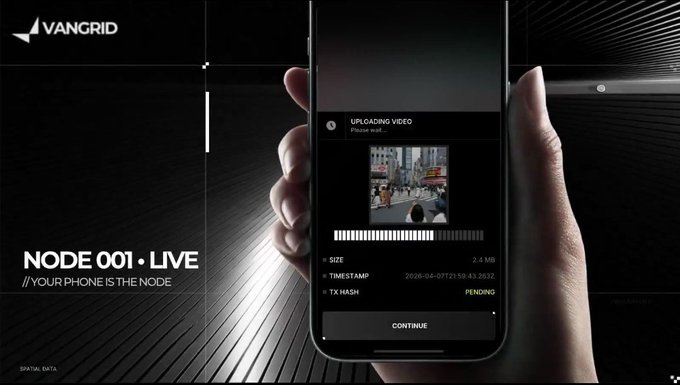 A promotional graphic for VANGRID NODE 001 - LIVE with the tagline 'YOUR PHONE IS THE NODE', showing a hand holding a phone displaying an 'UPLOADING VIDEO' screen with a pending status.