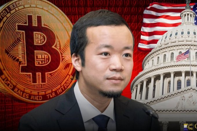 A composite image showing an Asian man in a suit superimposed over a large Bitcoin coin, the American flag, and the U.S. Capitol building against a red binary-code background.