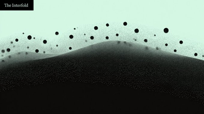 A minimalist abstract artwork titled "The Interfold" showing a wave-like landscape composed of dots, transitioning from a dark, mountainous form at the bottom to a lighter sky above with floating black spheres.