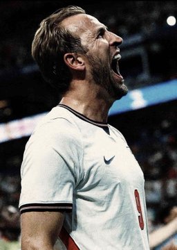 The image shows soccer player Harry Kane, wearing a white England national team jersey with the number 9, passionately shouting in celebration on the pitch. The accompanying post references Polymarket projections favoring Kane over Lamine Yamal for the Ballon d'Or award, with the image serving as visual confirmation of Kane's celebratory form after scoring.