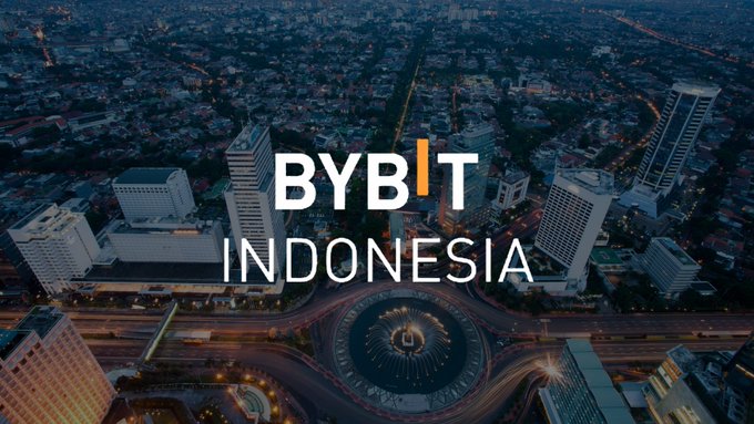 The image features an aerial view of a city with buildings at night, including one that says "Bybit Indonesia" written in orange letters. The text also mentions that Bybit Indonesia will be live as of July 15, 2006. This suggests that the photo was taken during the time period when the company's official launch date is scheduled to occur.