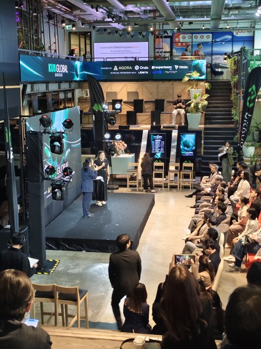 An indoor event labeled 'KWAN GLOBAL BKK24' with sponsors like Agora, Ondo, and Hypersteam, featuring a speaker on stage and an audience seated nearby.