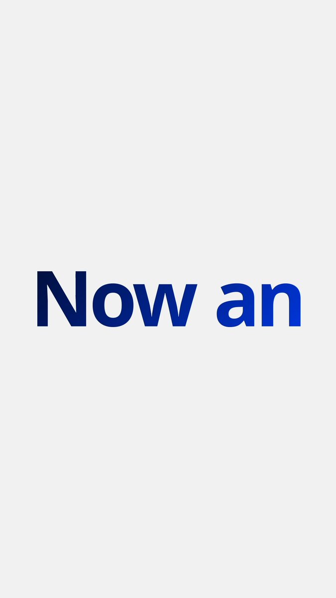 The image displays the text "Now an" in bold blue lettering against a light gray background. It serves as a partial phrase from a larger announcement, visually introducing the post's main message about Webull becoming an official X Cashtag partner.