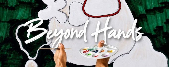 Banner image with cursive text 'Beyond Hands' over a background showing hands holding a paintbrush and palette in front of an abstract painting.
