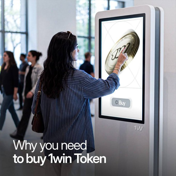 A woman in a blue striped shirt interacts with a large digital kiosk displaying a '1W' coin and a 'Buy' button, with promotional text reading 'Why you need to buy 1win Token'.