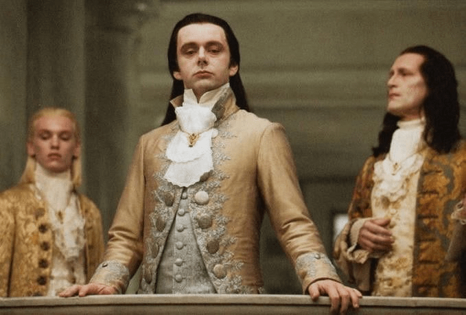 The image shows vampire characters in ornate 18th-century aristocratic attire standing at a balcony railing, evoking the elegant, refined, and above-it-all demeanor of ancient vampires looking down upon mortals below—mirroring how the meme suggests $ANSEM airdrop recipients regard ordinary crypto users with a sense of superiority and detachment.
