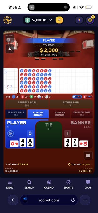 A screenshot of a baccarat game on roobet.com showing a $2,000 win, with the Player having a 5 (4 of clubs, Ace of spades) and the Banker having a 1 (4 of spades, 7 of clubs).